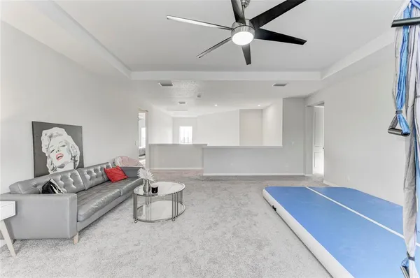 a view of a swimming pool with a table and chairs