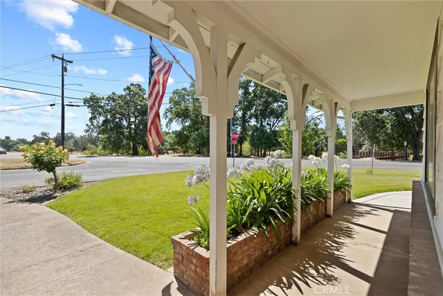 a view of a swimming pool with a porch