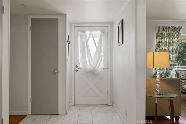 a bathroom with a sink a mirror and a toilet