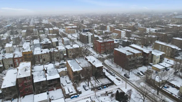 an aerial view of a city with lots of residential buildings