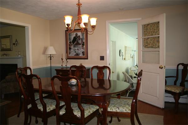53 Fox Farms Road Northampton, MA 01062 - Photo 3 of 5 a view of a dining room with furniture and chandelier