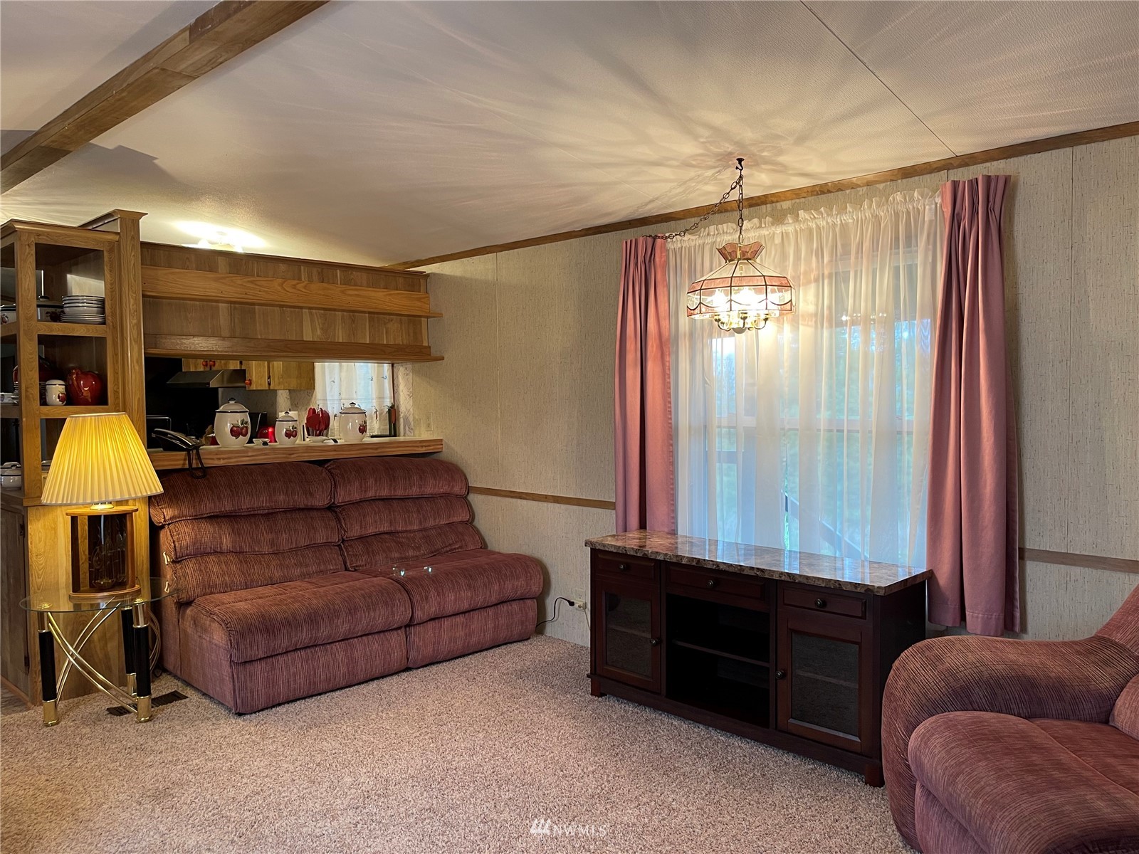 103 Klondike Road Republic, WA 99166 - Photo 13 of 38 a living room with furniture and a window