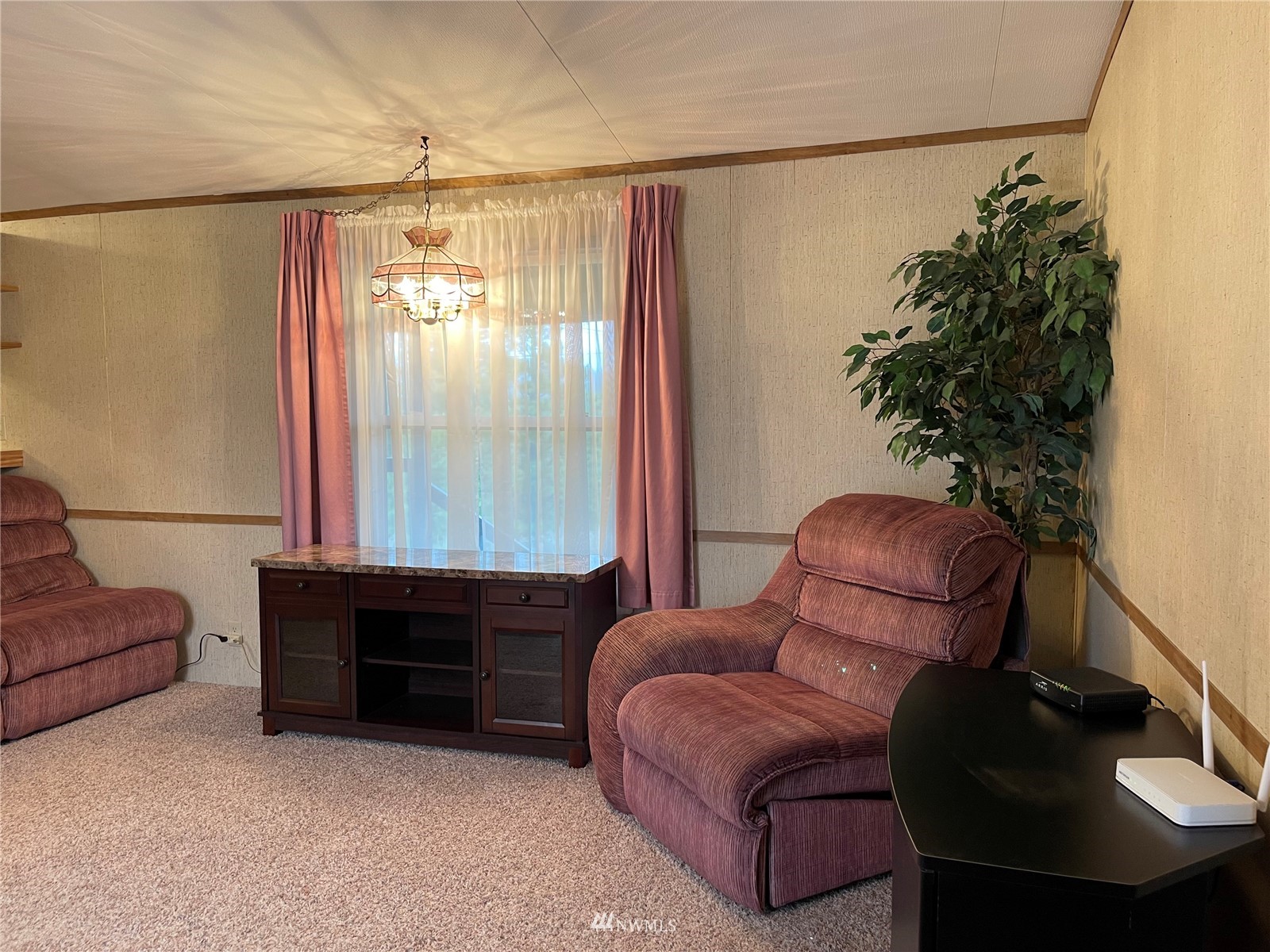 103 Klondike Road Republic, WA 99166 - Photo 14 of 38 a bedroom with a bed and a couch