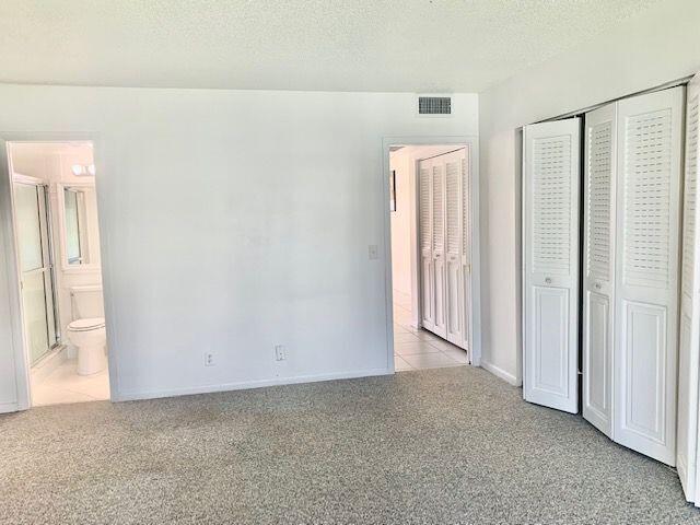 2093 Cornwall East Boca Raton, FL 33434 - Photo 10 of 35 Master Bedroom