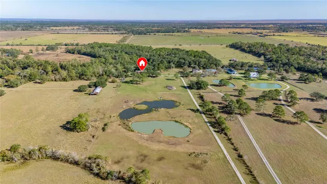 a bathroom with a sink a mirror and a vanity