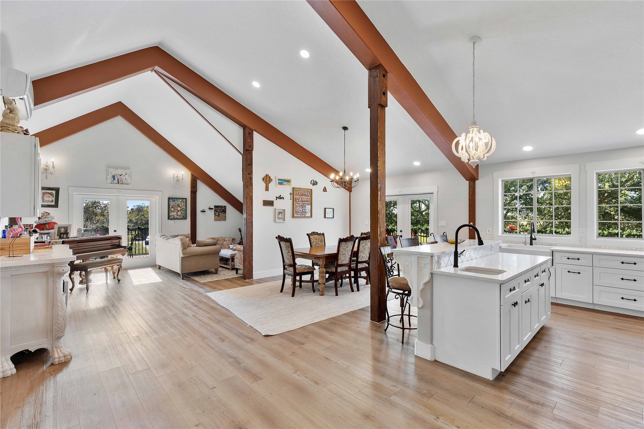 6641 Eagle Road Anahuac, TX 77514 - Photo 19 of 50 a living room with furniture a large window and wooden floors