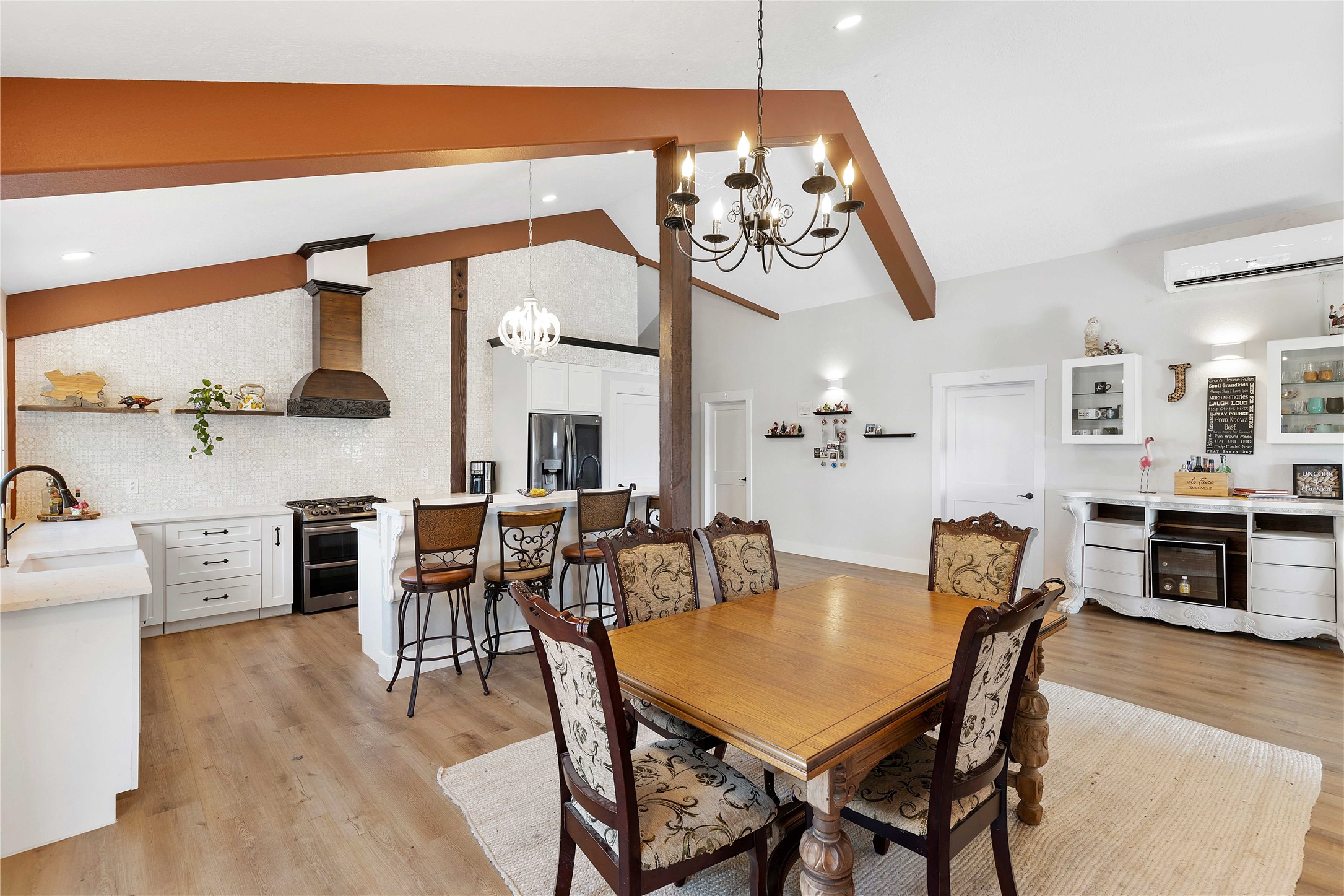 6641 Eagle Road Anahuac, TX 77514 - Photo 26 of 50 a view of a dining room with furniture and wooden floor