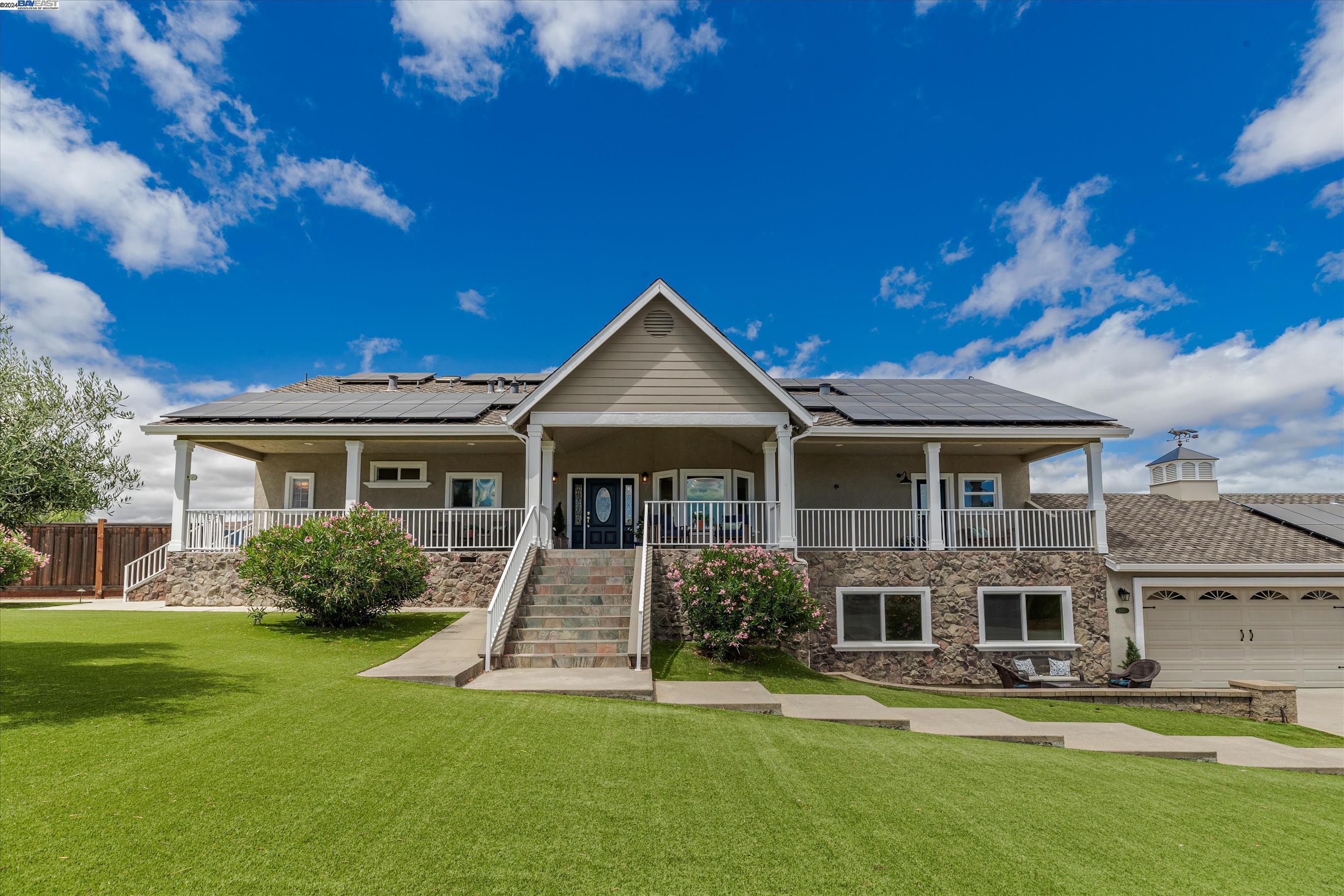 3929 Little Valley Road Sunol, CA 94586 - Photo 1 of 1 a front view of a house with a yard
