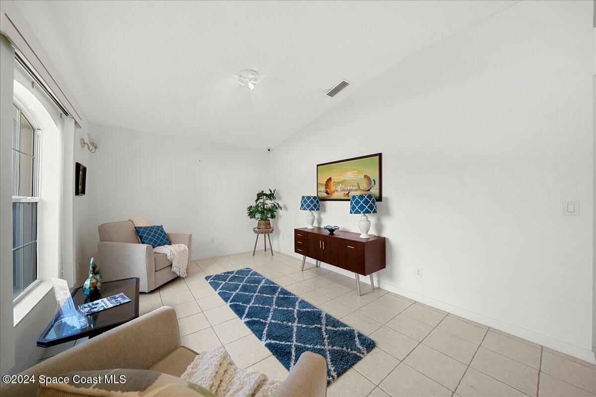 488 Abello Road Southeast Palm Bay, FL 32909 - Photo 5 of 35 Sitting Room/Family Room
