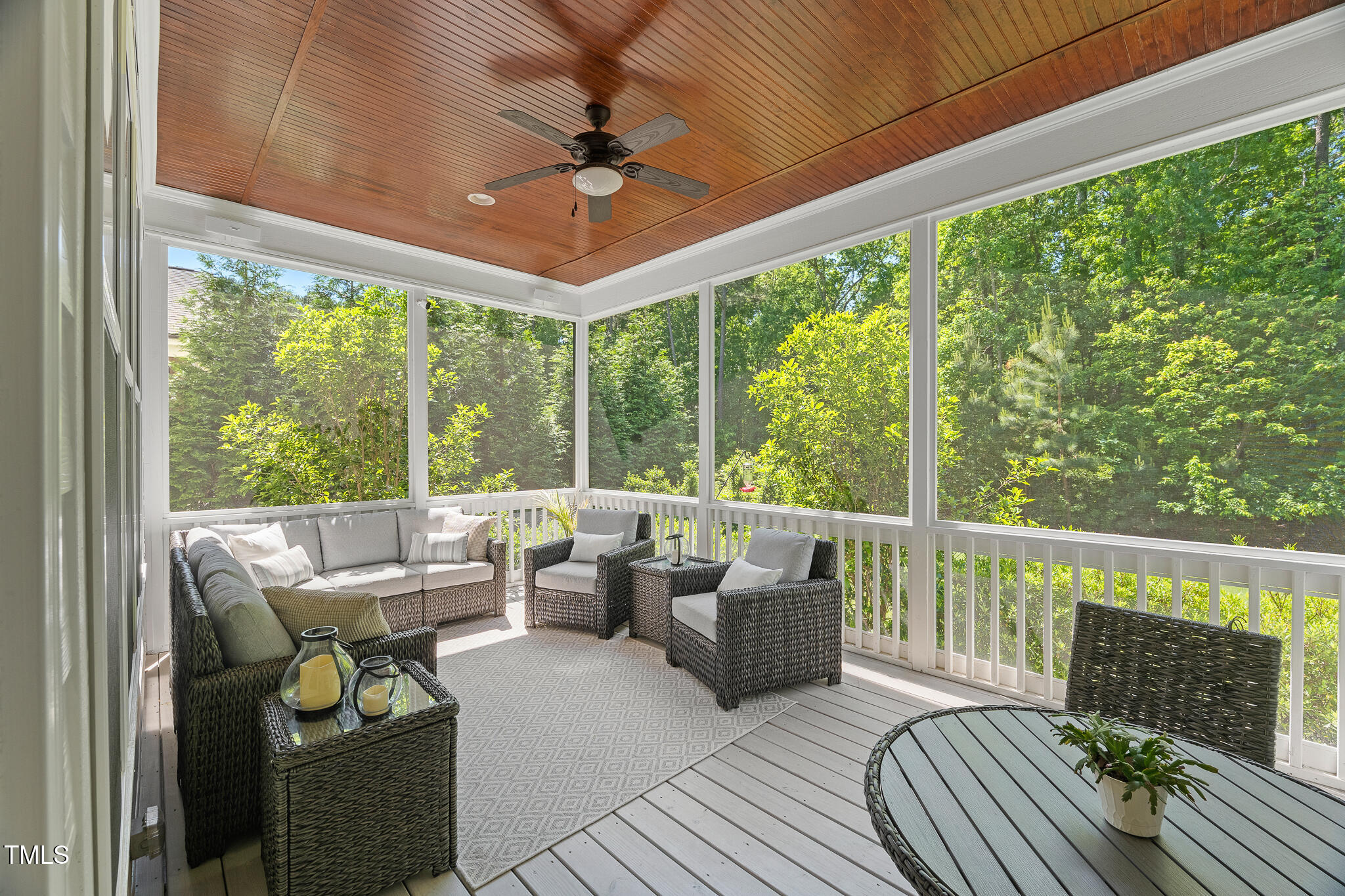 2993 Club Drive Raleigh, NC 27613 - Photo 36 of 94 a living room with furniture and a floor to ceiling window