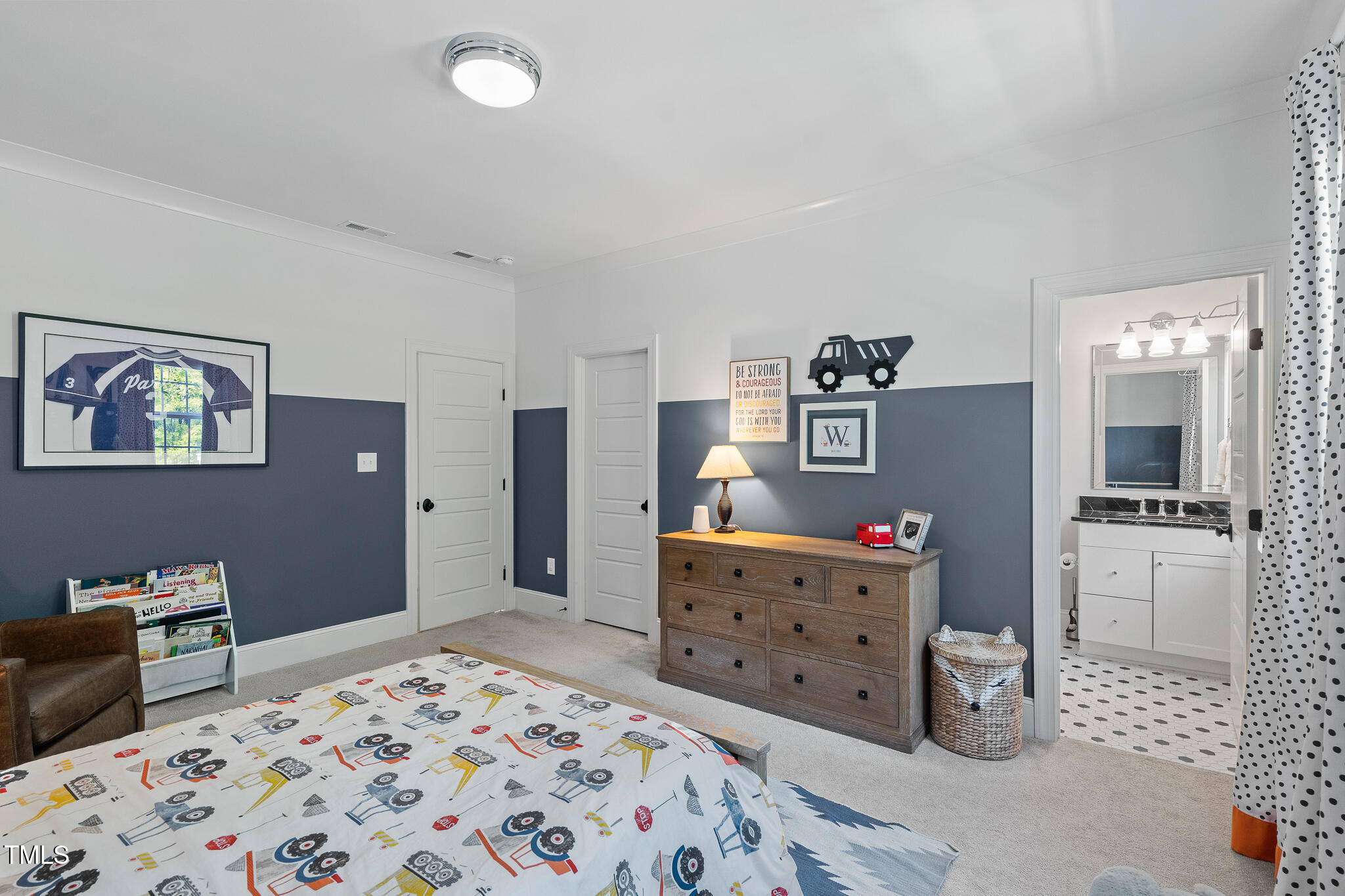 2993 Club Drive Raleigh, NC 27613 - Photo 42 of 94 a bedroom with a bed and a dresser in it