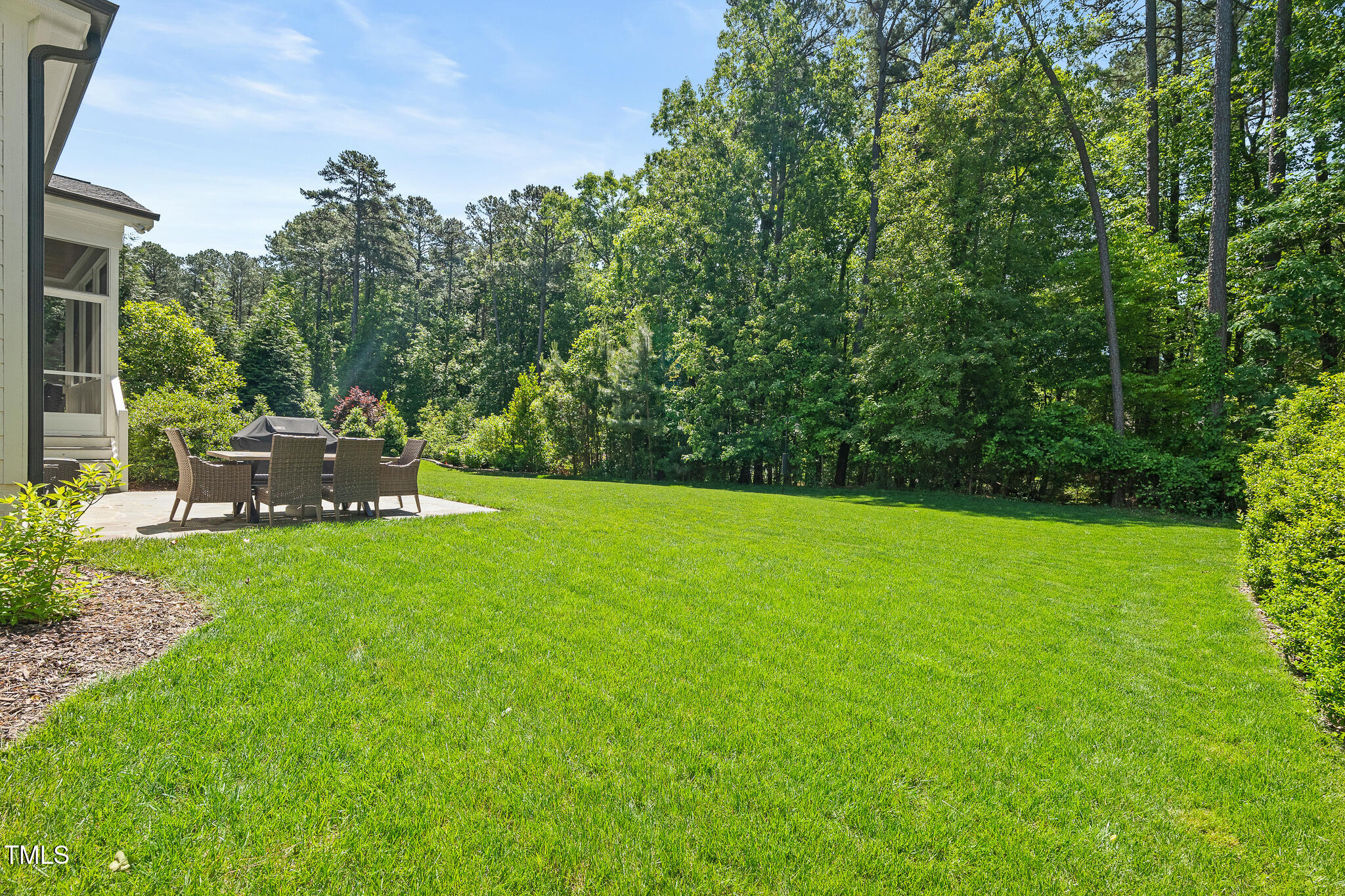 2993 Club Drive Raleigh, NC 27613 - Photo 80 of 94 a view of a backyard with large trees