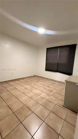 a view of a livingroom with wooden floor