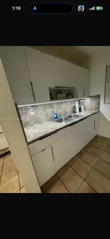 a view of storage and utility room