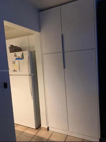 a view of a storage & utility room with washer and dryer