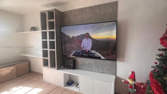 a living room with furniture and a couch