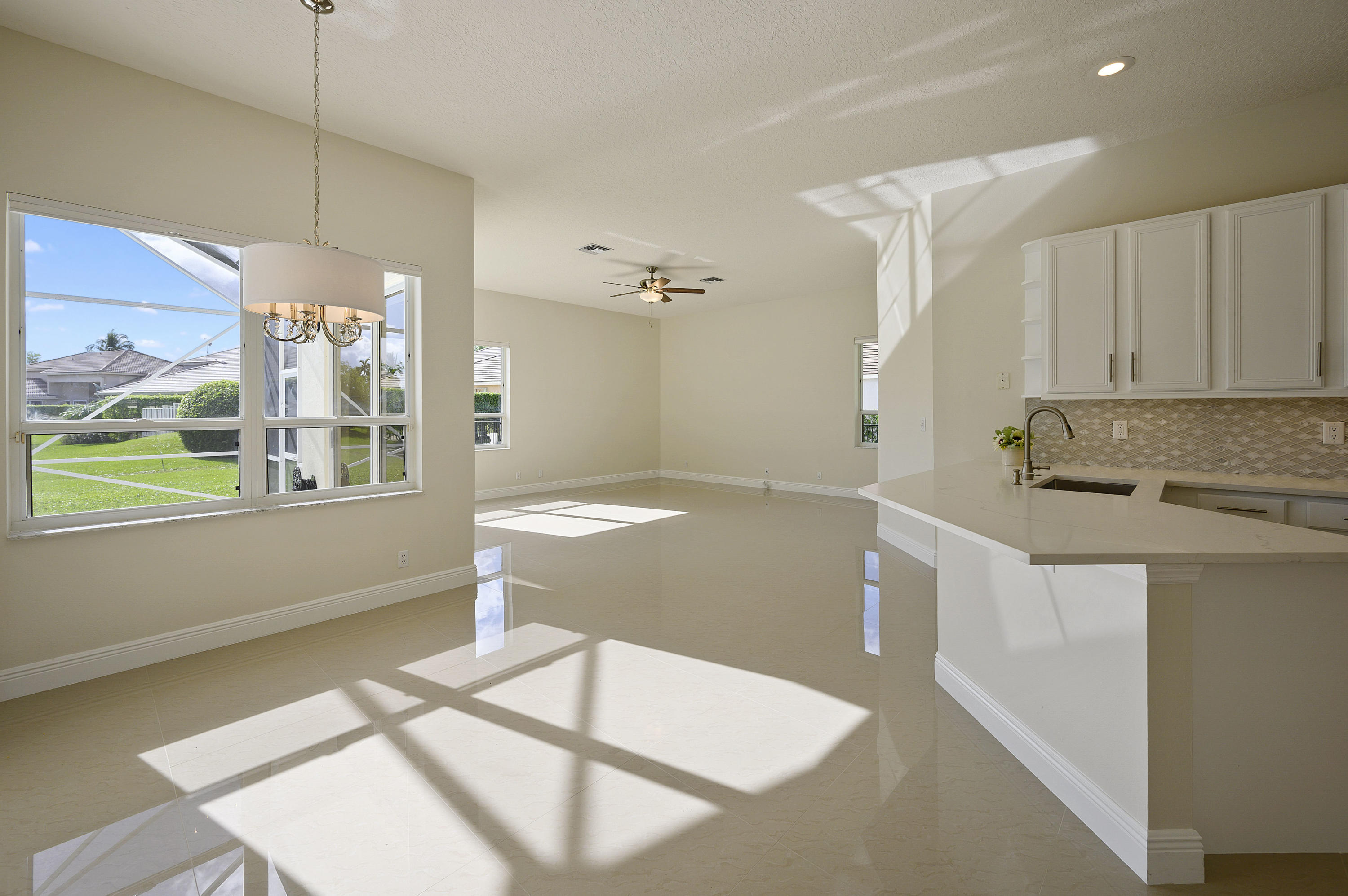 21317 Gosier Way Boca Raton, FL 33428 - Photo 23 of 60 Kitchen & Family Room
