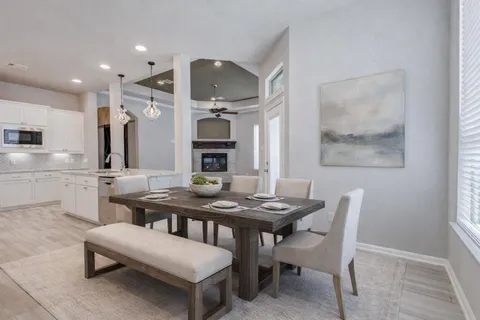 a view of a dining room with furniture