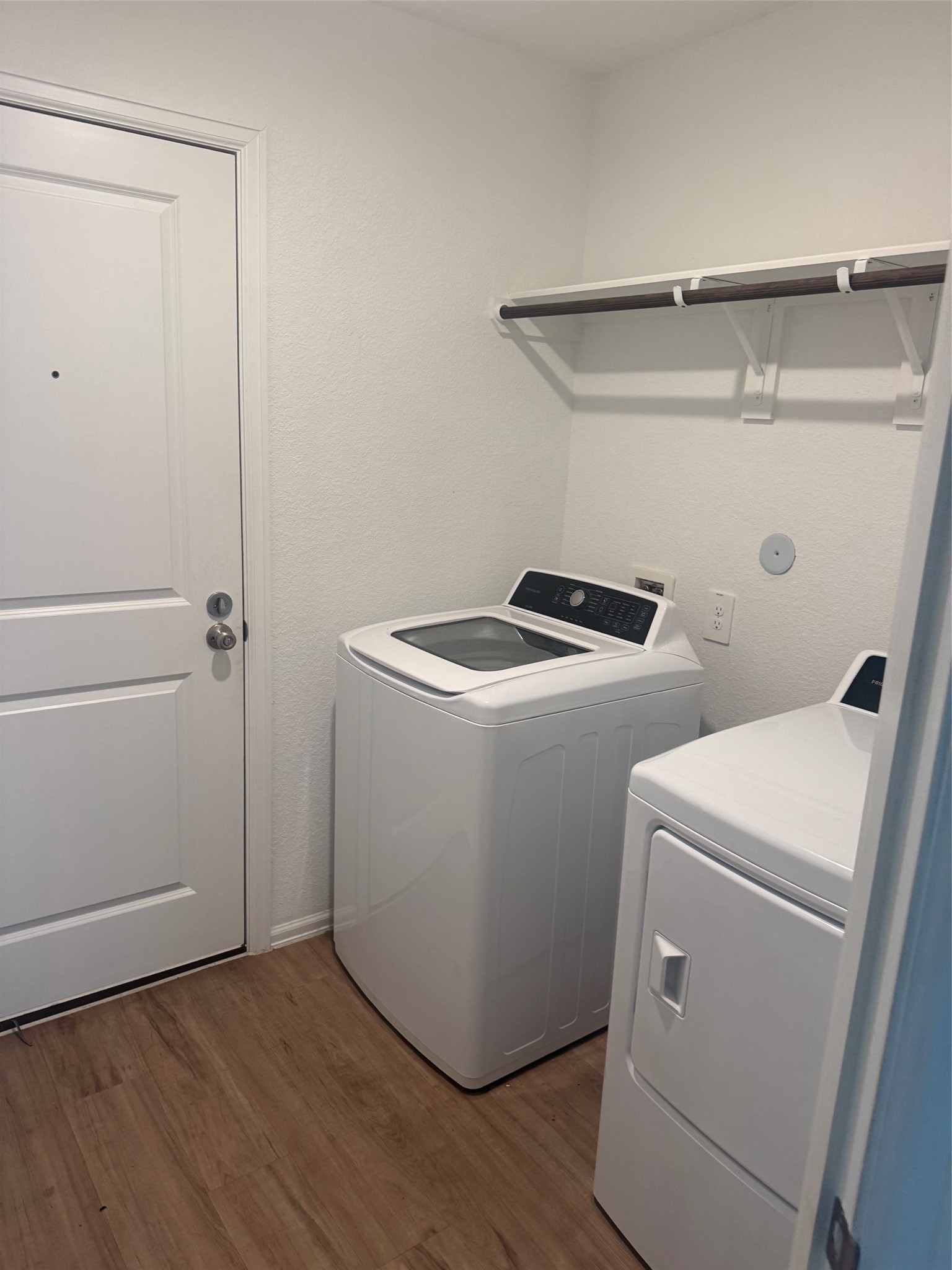 3202 Holly Stokes Way Conroe, TX 77301 - Photo 11 of 24 a utility room with dryer and washer