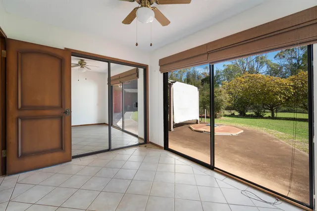 a view of a room with a large window