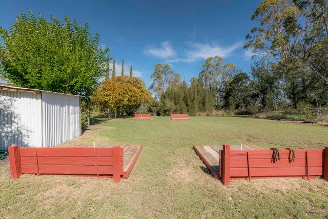 a view of a bench in a garden