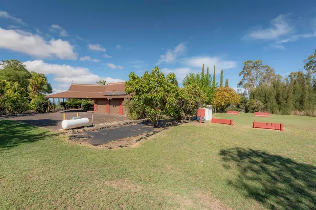 a view of a bench in front of a building