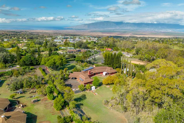 a view of a lake with a yard