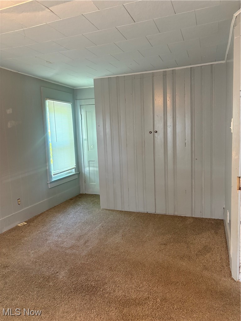 11 Front Street Rittman, OH 44270 - Photo 20 of 31 Unfurnished bedroom featuring carpet
