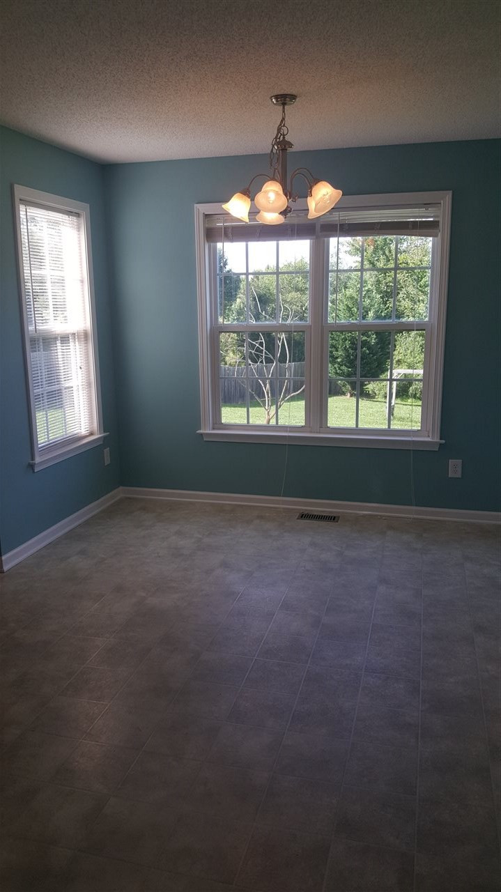 668 Slate Top House Road Clayton, NC 27520 - Photo 17 of 27 Another view of the large space for your dining table and entertaining your guests! Dining Room