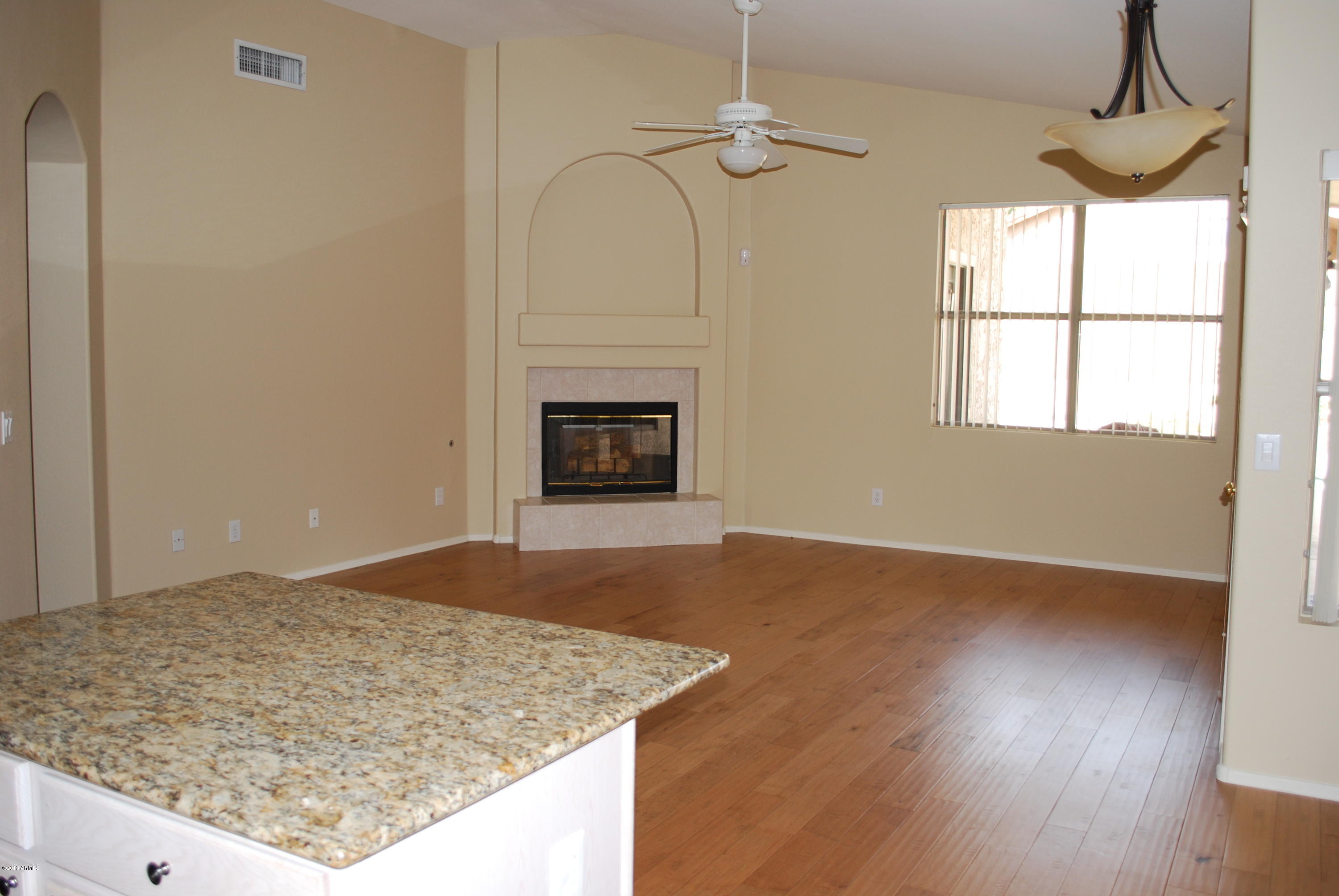 4622 East Weaver Road Phoenix, AZ 85050 - Photo 9 of 23 View from Kitchen into Family Room