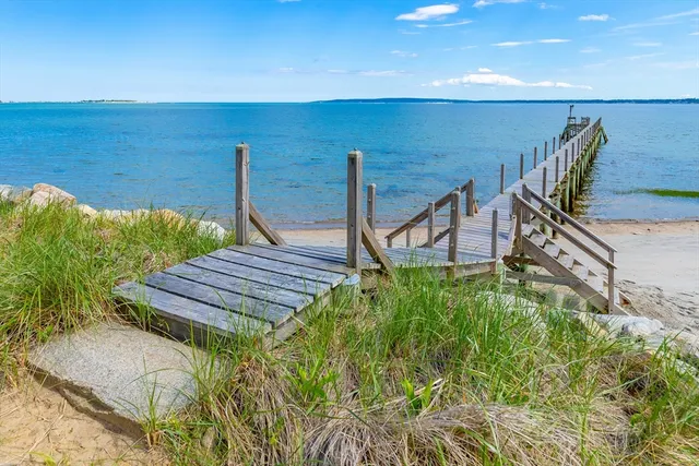 a wooden bench sitting in the middle of a building