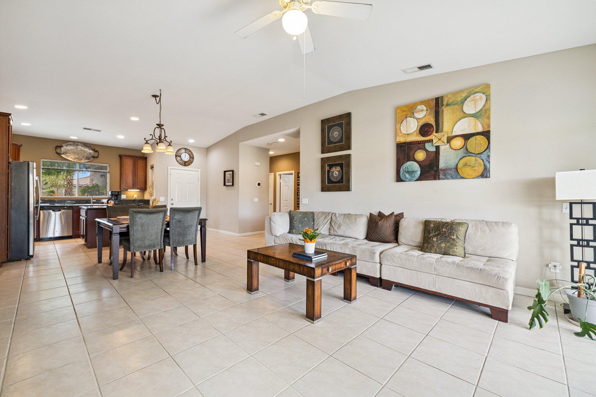 49151 Biery Street Indio, CA 92201 - Photo 14 of 26 a living room with furniture and kitchen view