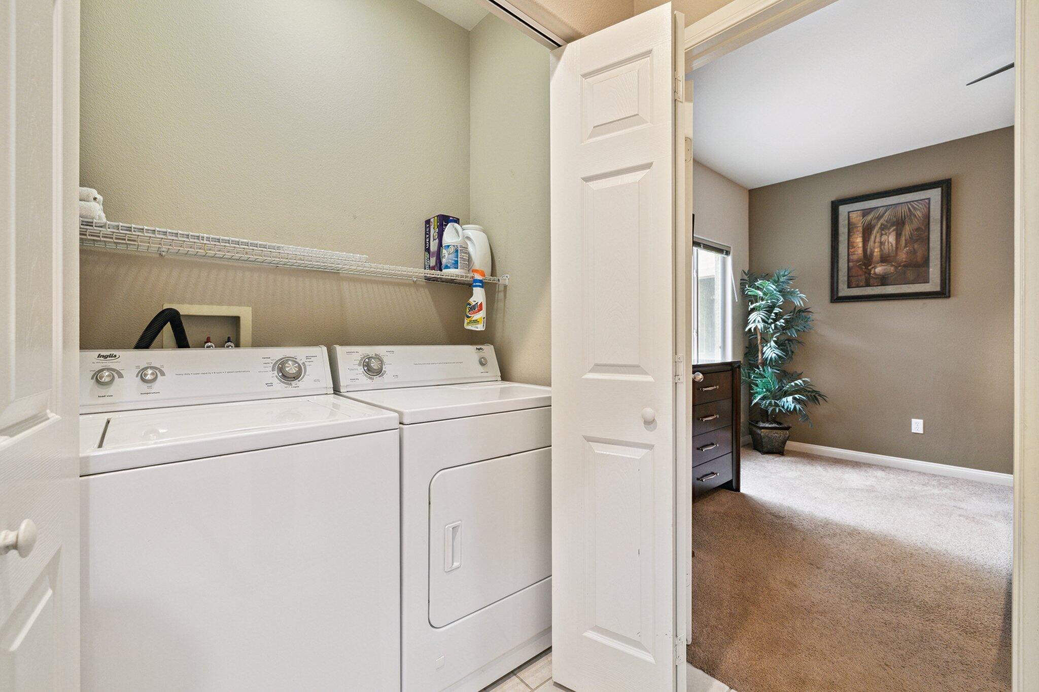 49151 Biery Street Indio, CA 92201 - Photo 19 of 26 a utility room with dryer and washer