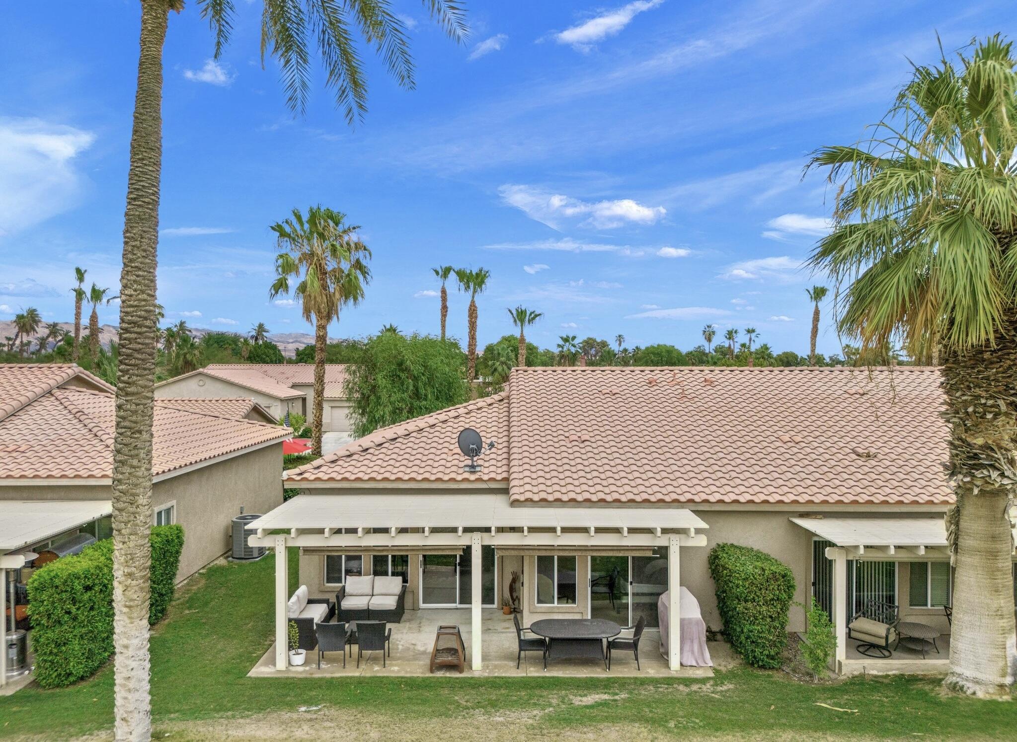 49151 Biery Street Indio, CA 92201 - Photo 20 of 26 a aerial view of a house with a yard
