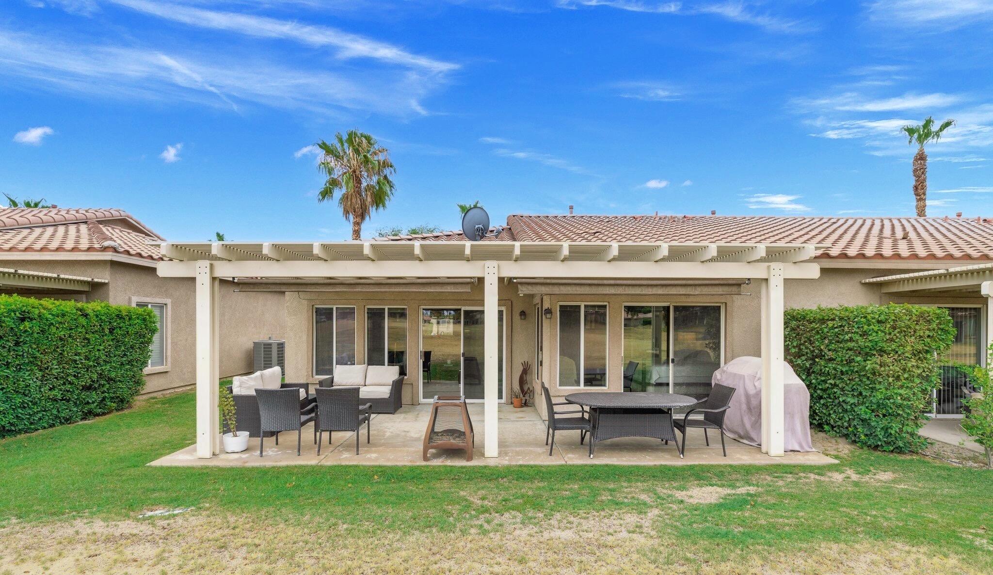 49151 Biery Street Indio, CA 92201 - Photo 3 of 26 a view of a house with backyard porch and sitting area