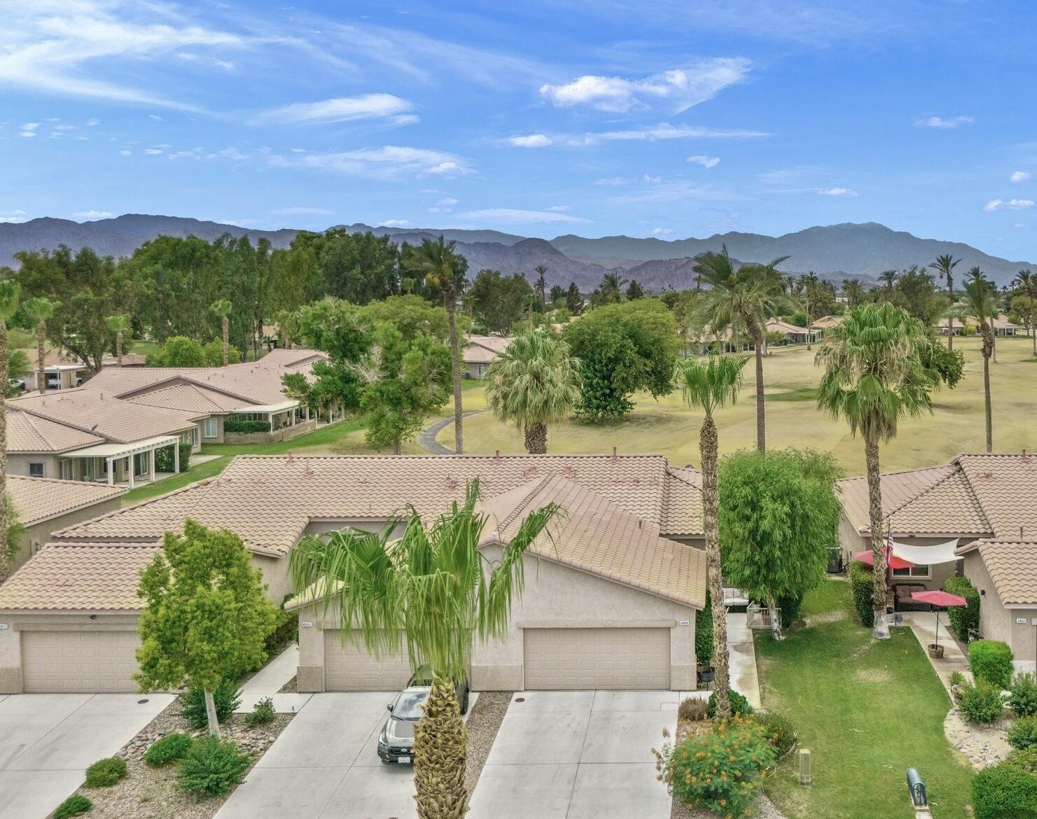 49151 Biery Street Indio, CA 92201 - Photo 5 of 26 a view of a lake with a mountain in the background