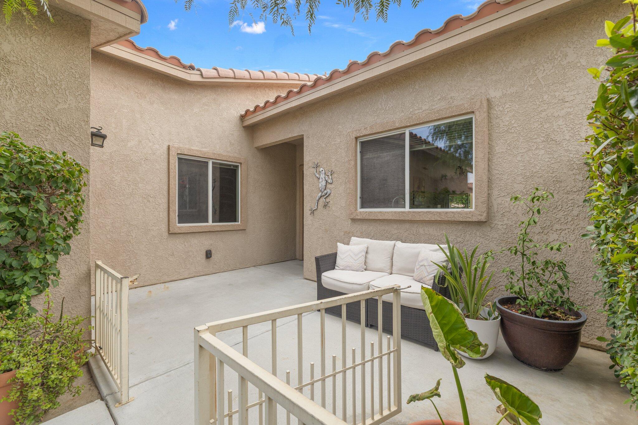 49151 Biery Street Indio, CA 92201 - Photo 8 of 26 a view of house with patio