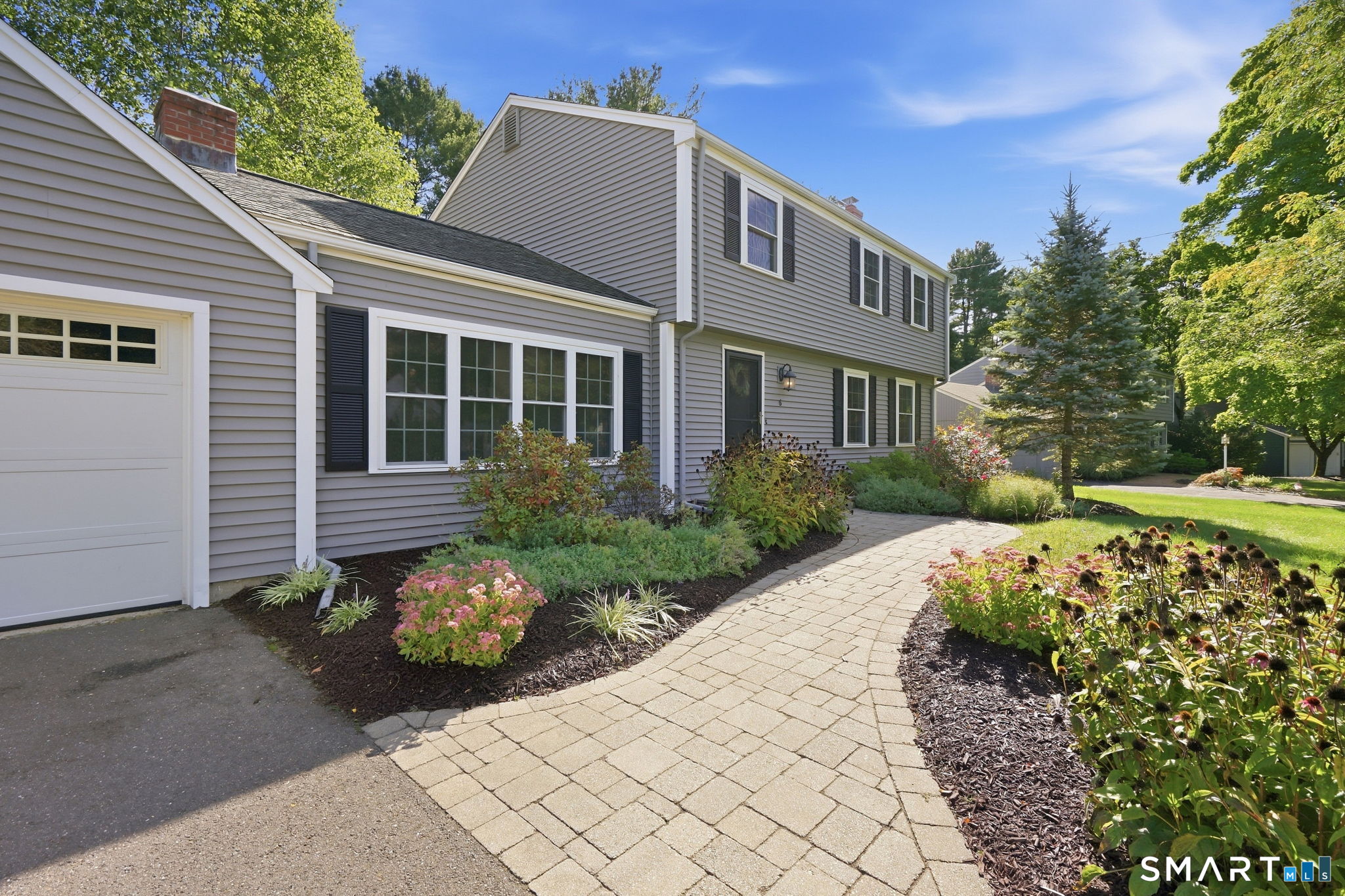 6 Cornfield Road Simsbury, CT 06070 - Photo 4 of 40 A graceful walkway and beautiful professional landscaping greets you as you walk up to this lovely home!
