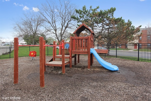 2028 North Rand Road, Unit 201 Palatine, IL 60074 - Photo 11 of 12 a view of a park with slide