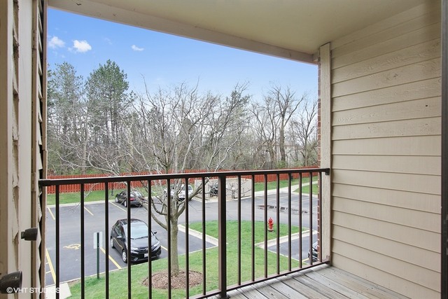 2028 North Rand Road, Unit 201 Palatine, IL 60074 - Photo 10 of 12 a view of a balcony with window