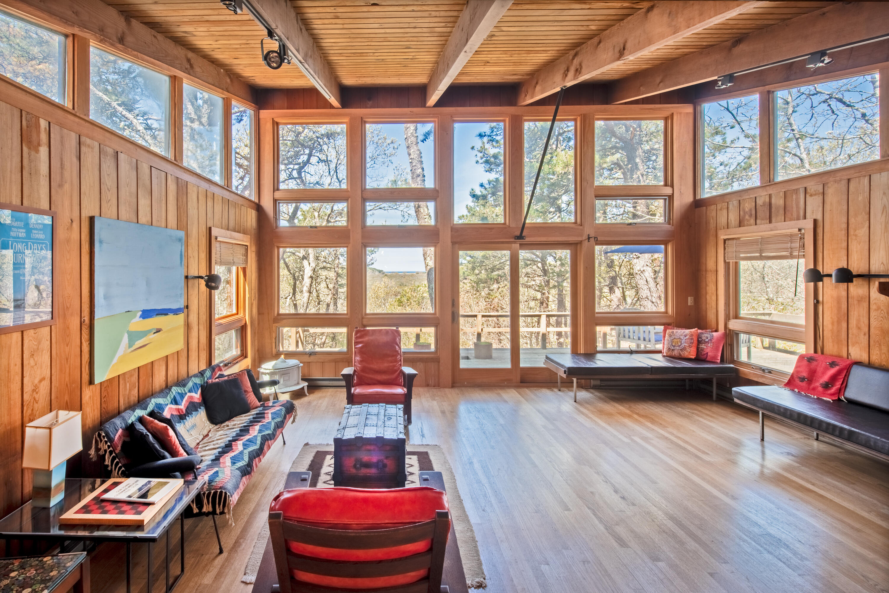 1162 Browns Neck Road Wellfleet, MA 02667 - Photo 11 of 30 a living room with furniture and a floor to ceiling window