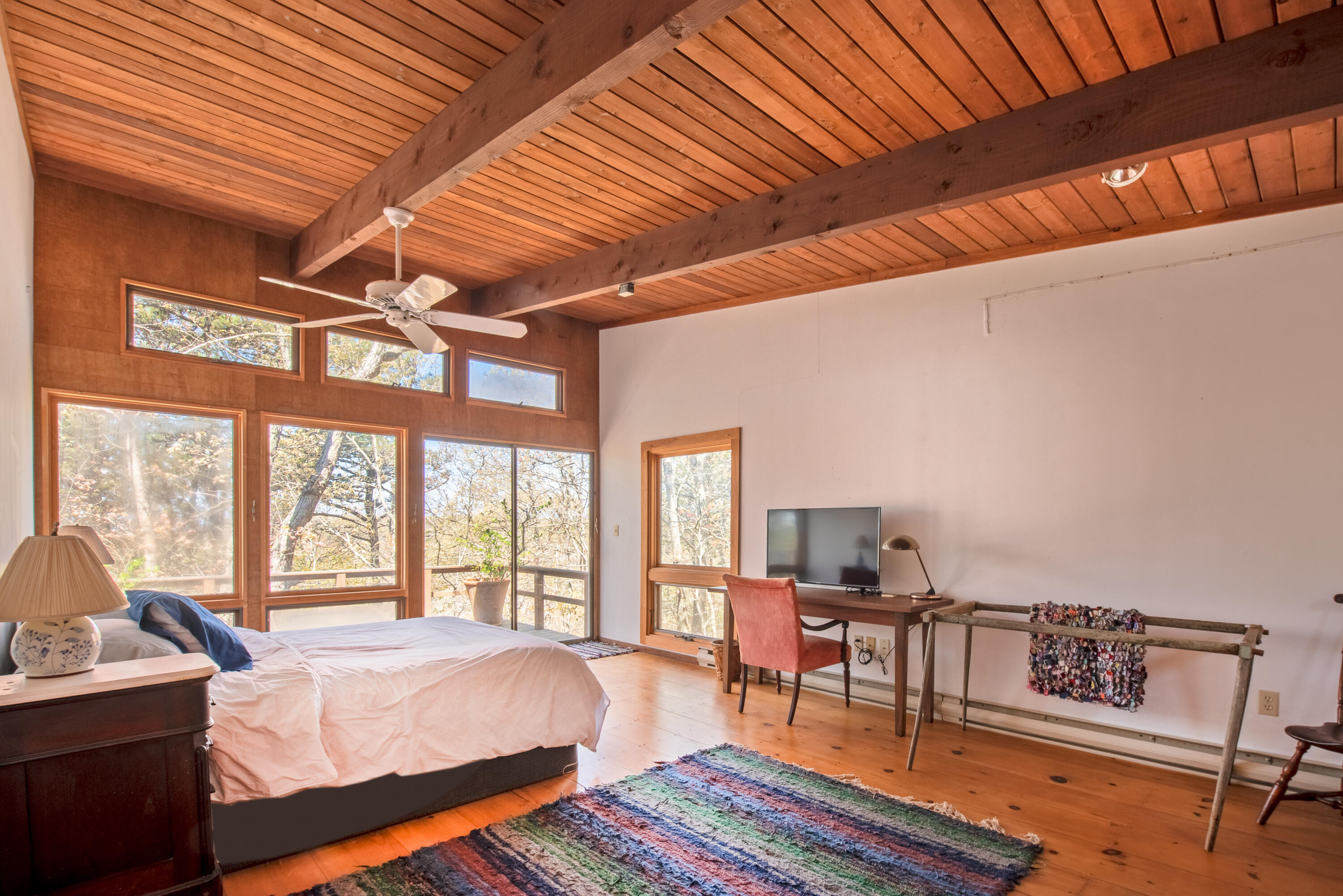 1162 Browns Neck Road Wellfleet, MA 02667 - Photo 19 of 30 a bed room with a bed and a chair