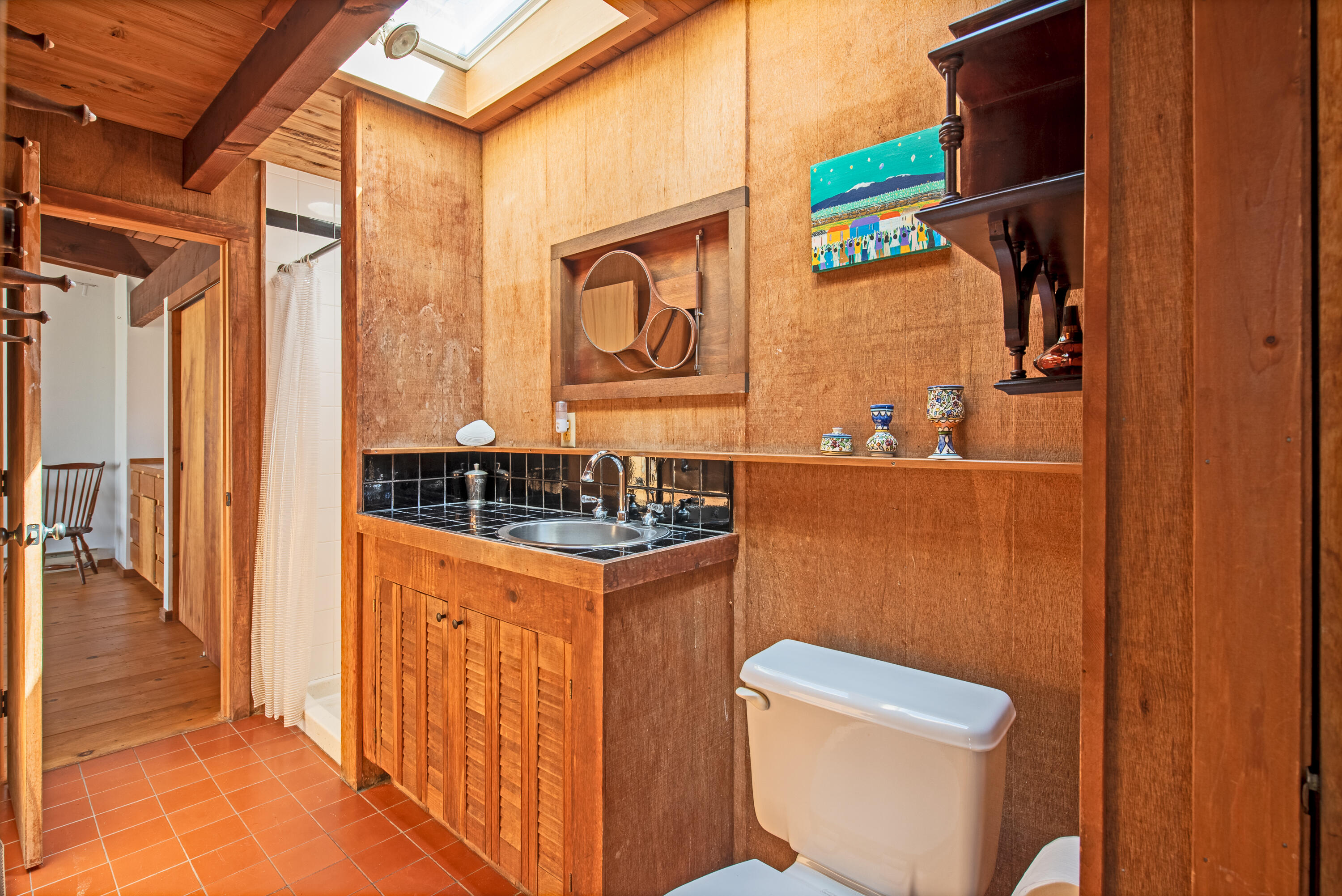 1162 Browns Neck Road Wellfleet, MA 02667 - Photo 21 of 30 a bathroom with a sink a toilet and a shower