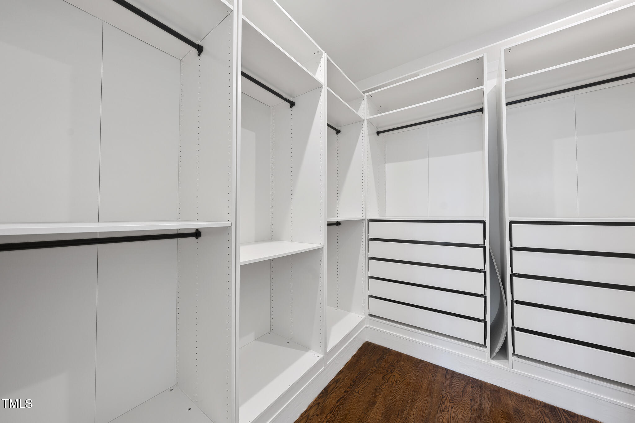 729 Daniel Rdg Road Wendell, NC 27591 - Photo 24 of 57 a view of walk in closet with empty racks