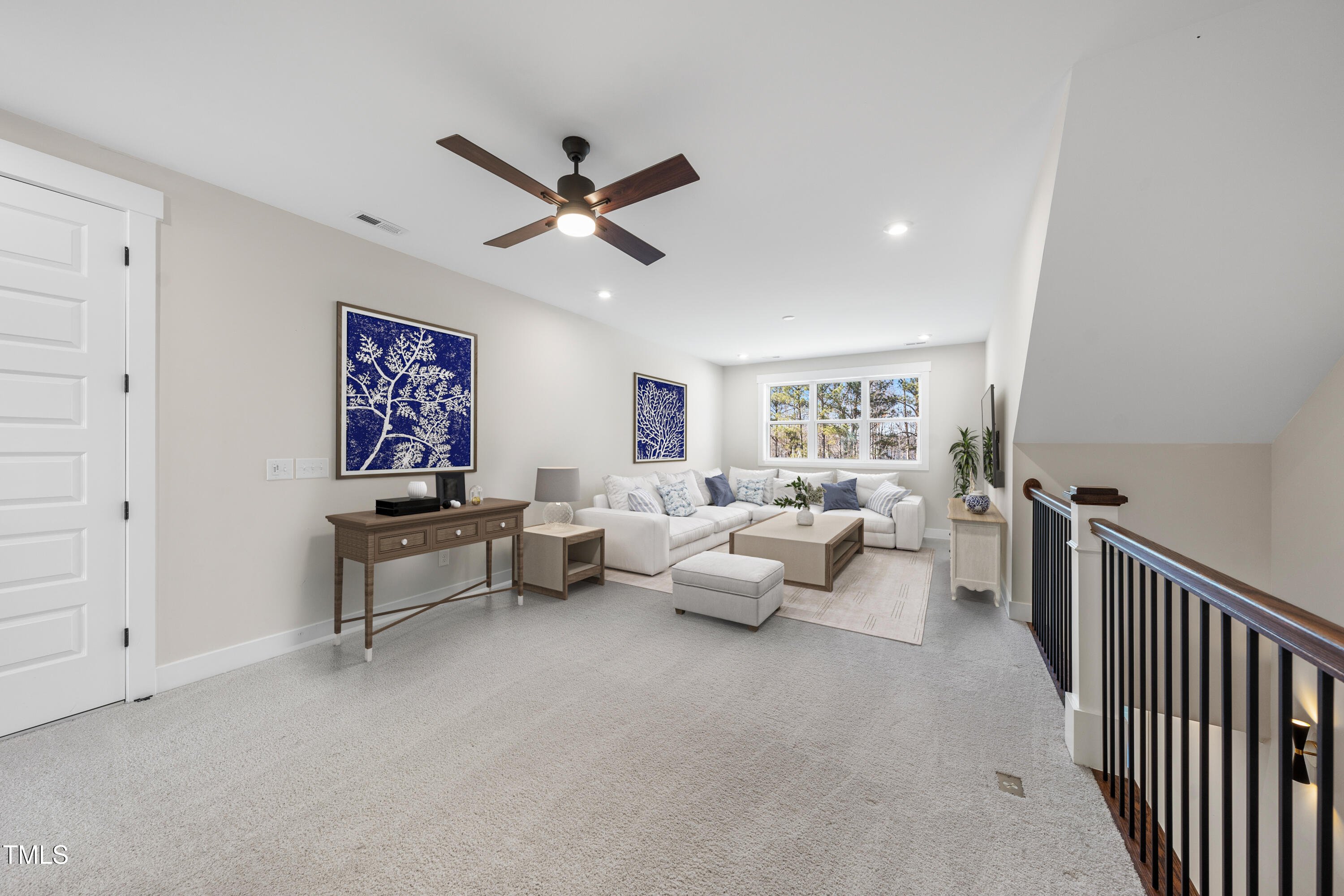 729 Daniel Rdg Road Wendell, NC 27591 - Photo 25 of 57 a living room with furniture and a ceiling fan