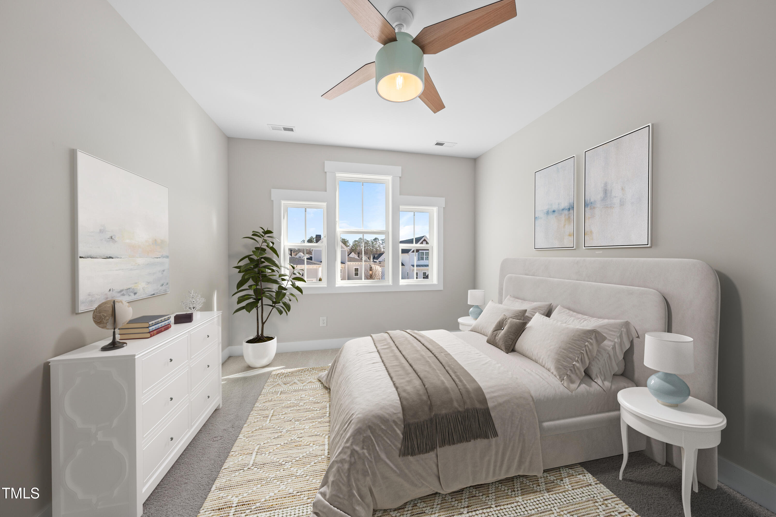 729 Daniel Rdg Road Wendell, NC 27591 - Photo 28 of 57 a bedroom with a bed and a chandelier