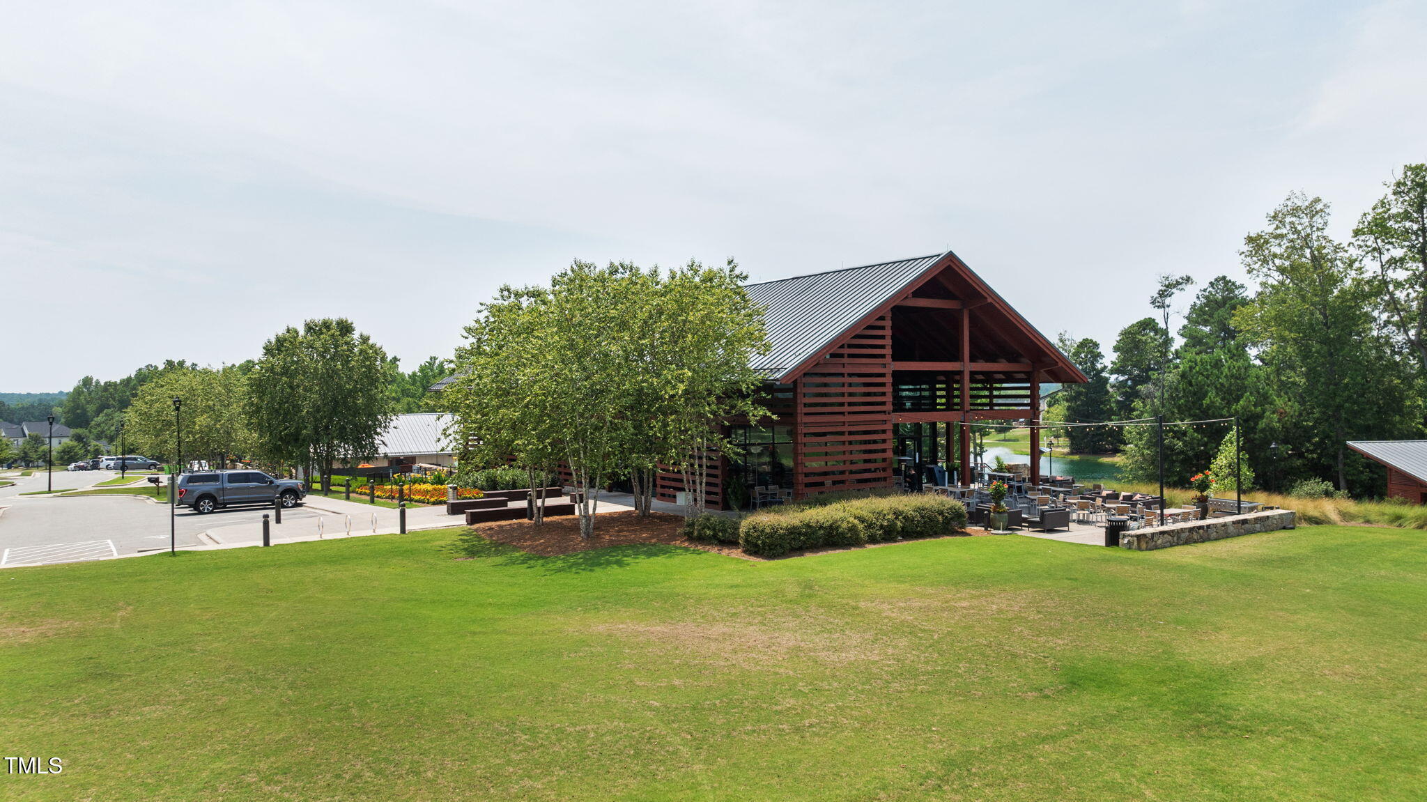 729 Daniel Rdg Road Wendell, NC 27591 - Photo 40 of 57 a view of a house with a yard patio and sitting area