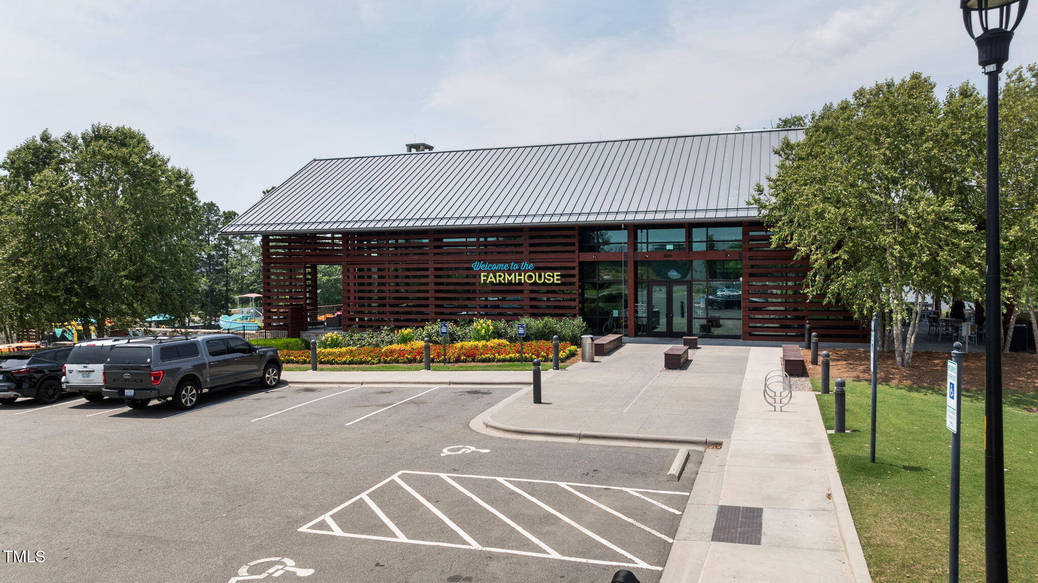 729 Daniel Rdg Road Wendell, NC 27591 - Photo 54 of 57 a view of a patio with table and chairs with wooden floor and fence