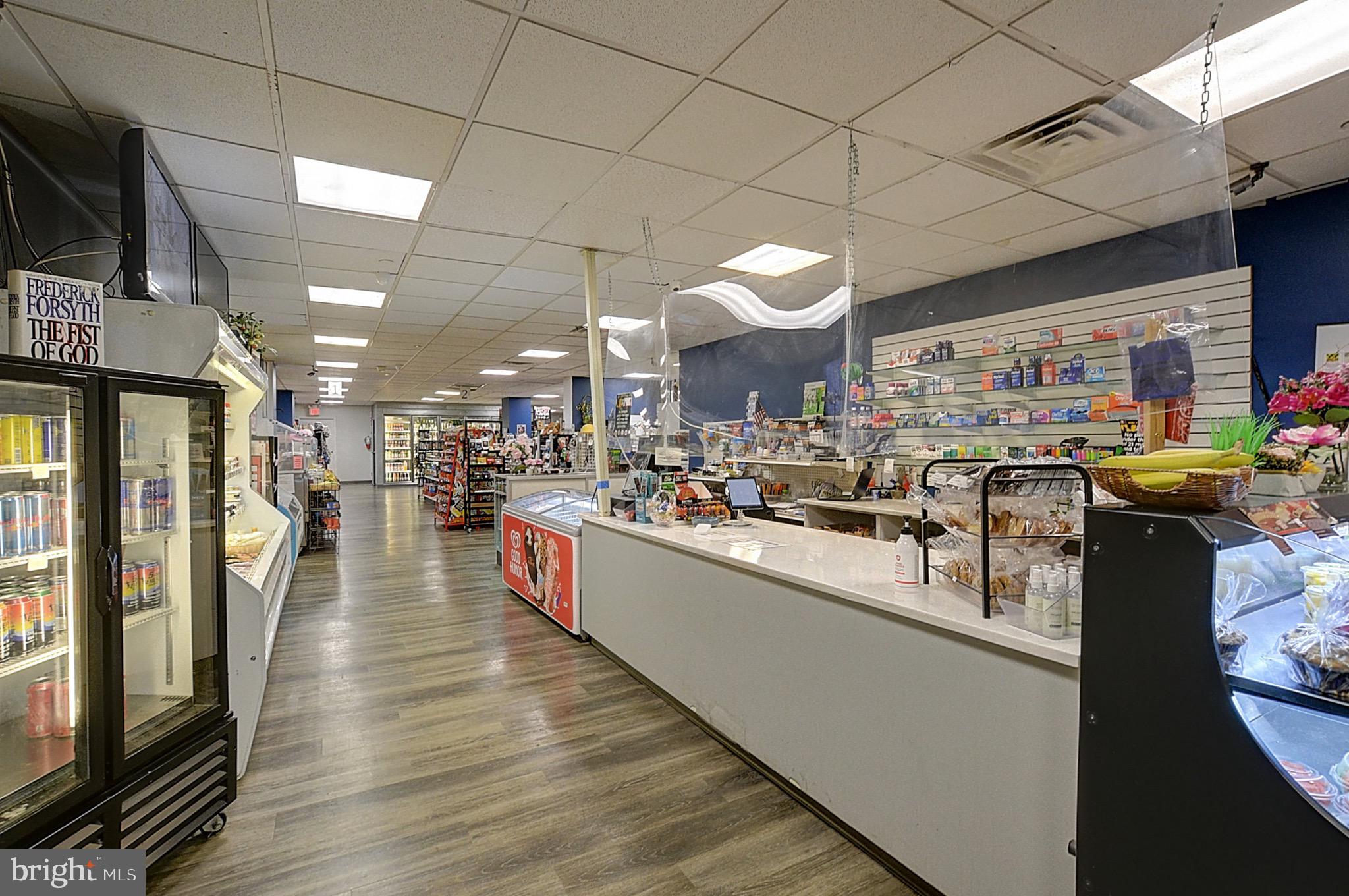 5225 Pooks Hill Road, Unit 1005S Bethesda, MD 20814 - Photo 27 of 32 a large kitchen with lots of counter space and stainless steel appliances