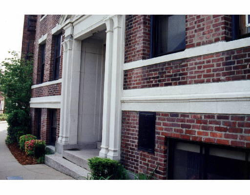 110 Lanark Road, Unit 1 Boston, MA 02135 - Photo 1 of 1 a front view of a house with outdoor seating